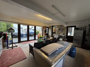 STORE/PREVOUSLY DOUBLE GARAGE TO KITCHEN DOOR- click for photo gallery